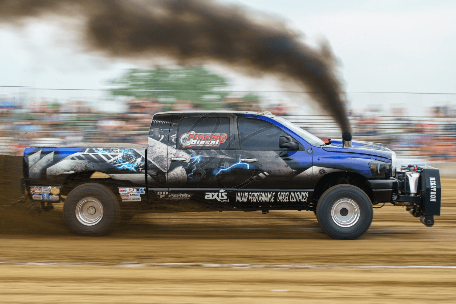 Megatron vehicle on track with lots of gas emitting