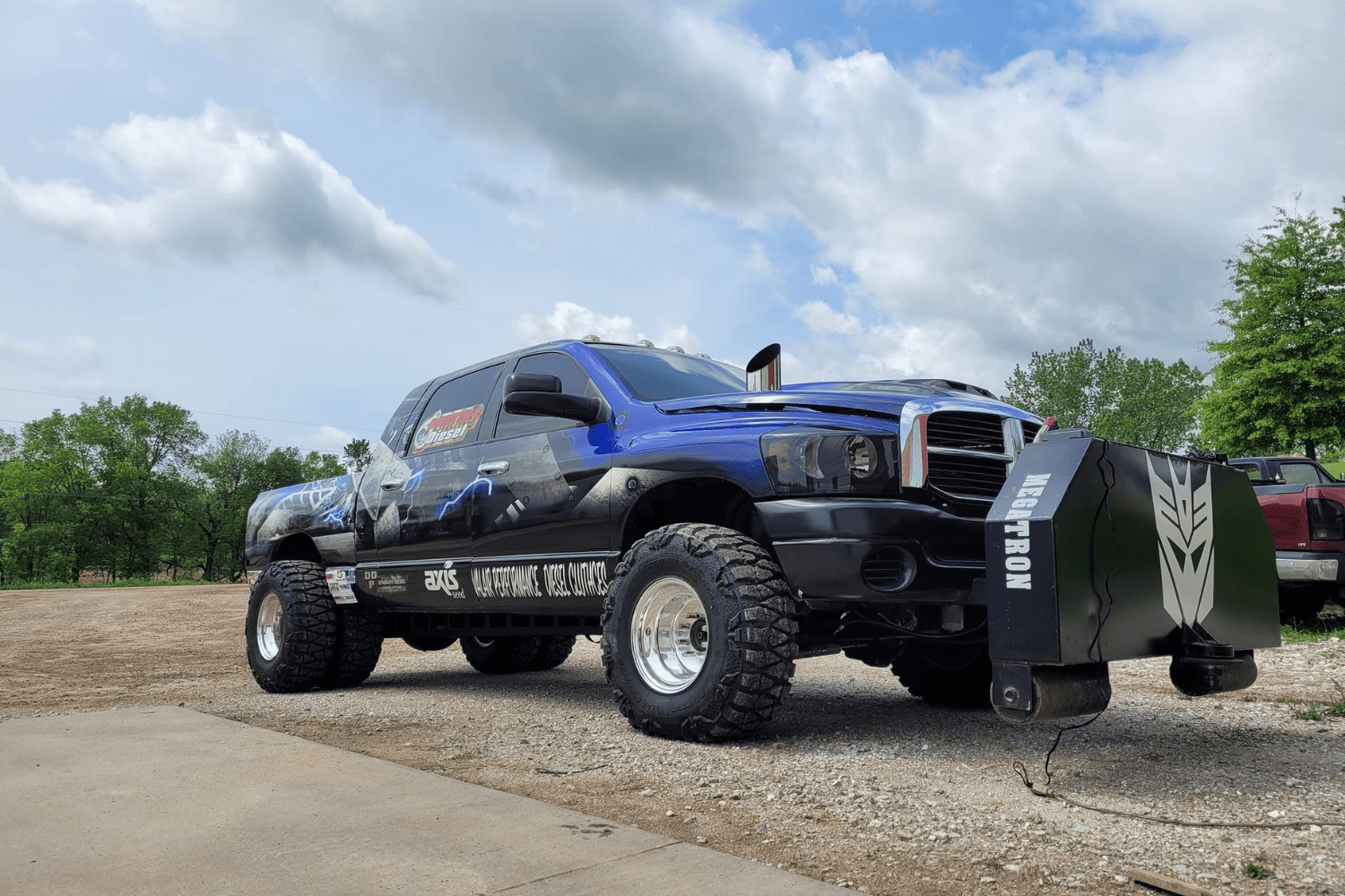 Megatron blue vehicle on parking area